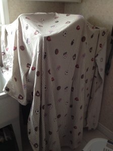 What's underneath this bed sheet? More laundry, of course.